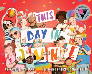 The illustrated cover of This Day in June. A diverse group of people holding signs to spell out the title of the book. There is a Stonewall Book award medal in the corner. 